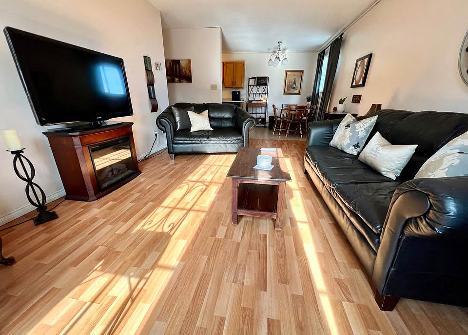 Living room of a two-bedroom apartment at 62 Biggs Street, Fredericton